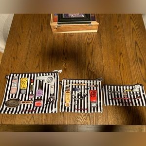 Trio of Henri Bendel makeup bags in various sizes. Two have never been used